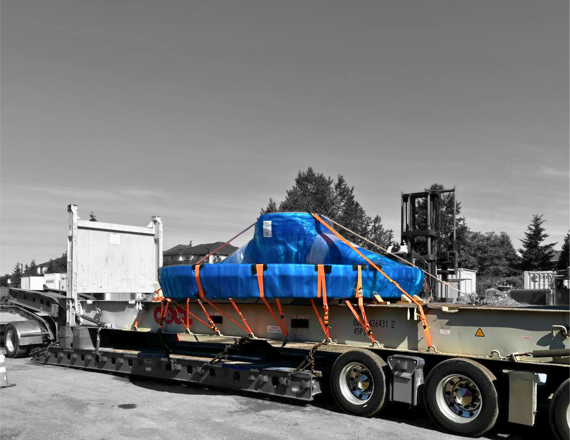 Secured and strapped on a flat rack, ready for the road leg out of Vancouver.